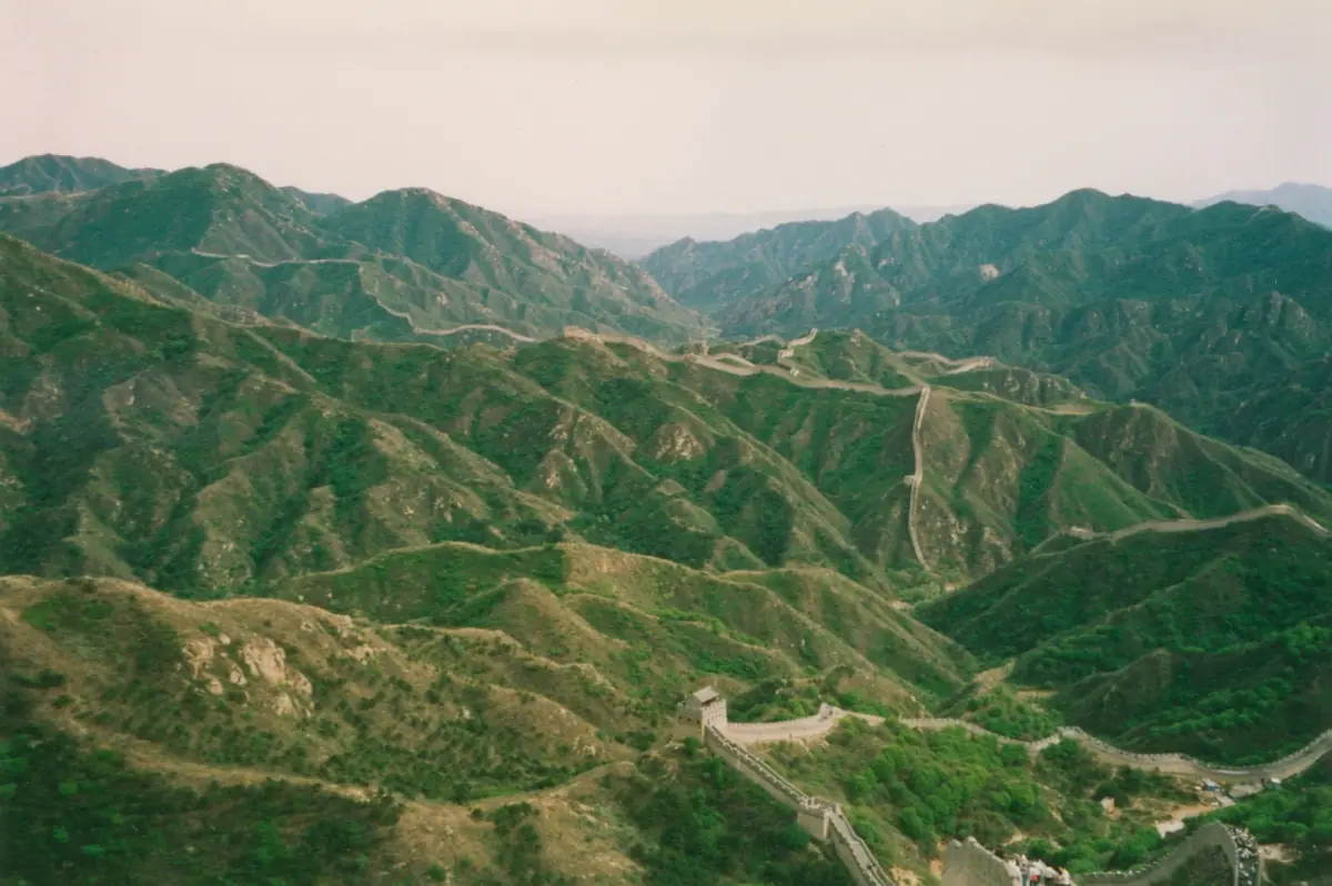 The wall crossing green mountains at Badaling
