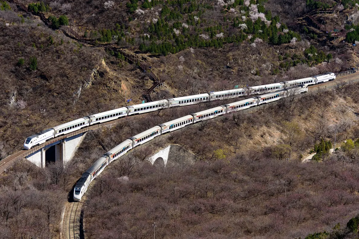 A train passing Juyongguan in spring